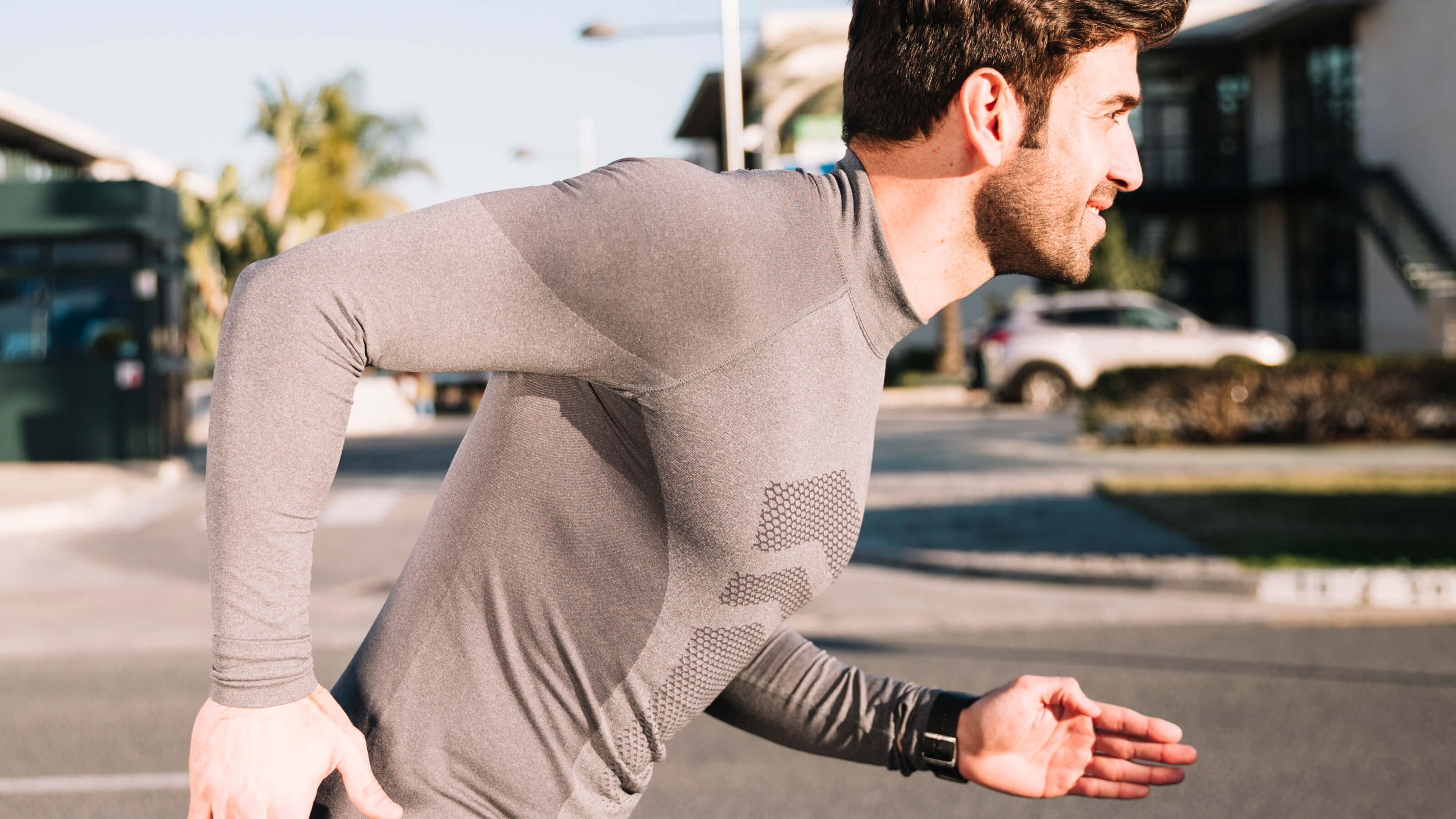 Man in gray athletic shirt